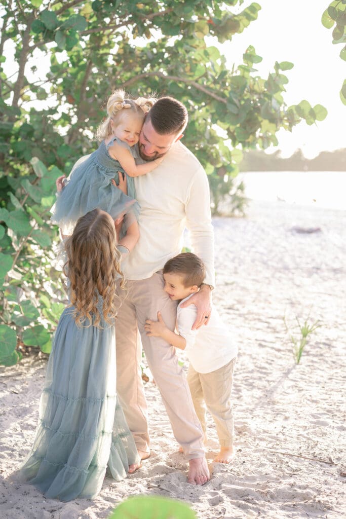 Dad with his kids on the beach | Sarah Williams Portraits